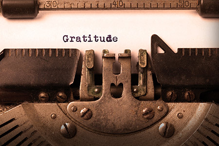 gratitude on a sheet of paper in a typewriter
